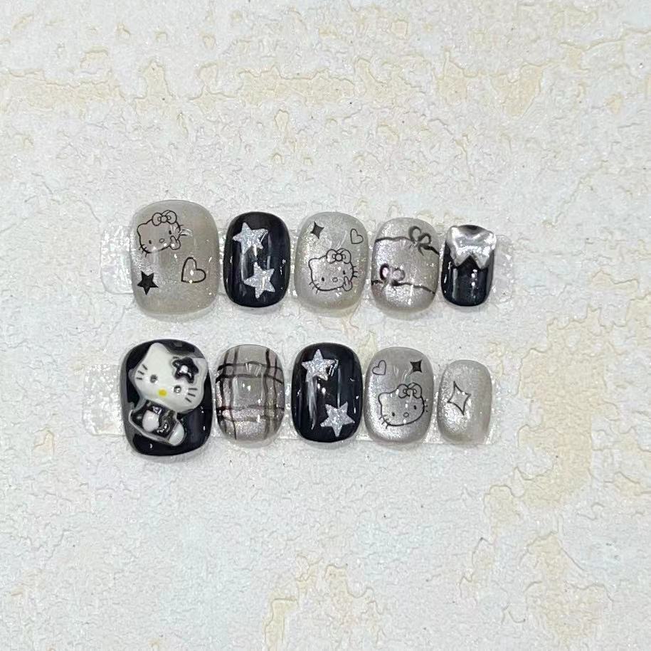 Fun and Whimsical Press-On Nail Set with Cartoon Accents Bowlift