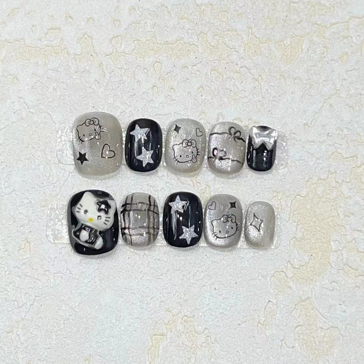 Fun and Whimsical Press-On Nail Set with Cartoon Accents Bowlift