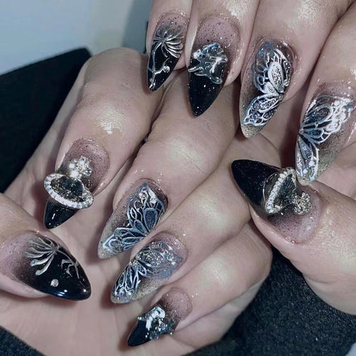Artful stiletto nails with delicate embellishments and glamour accents Bowlift