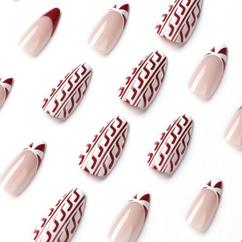 Elegant artificial nails in festive winter design Bowlift