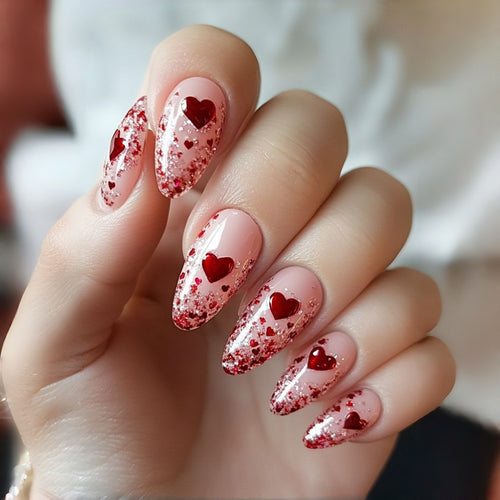 Glamorous artificial nails with heart design and glitter Bowlift