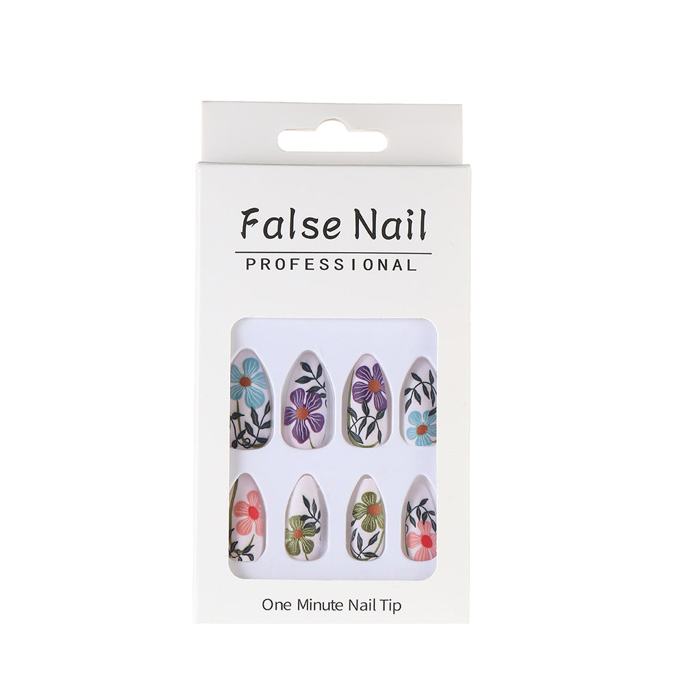 Artificial nails with floral accent Bowlift