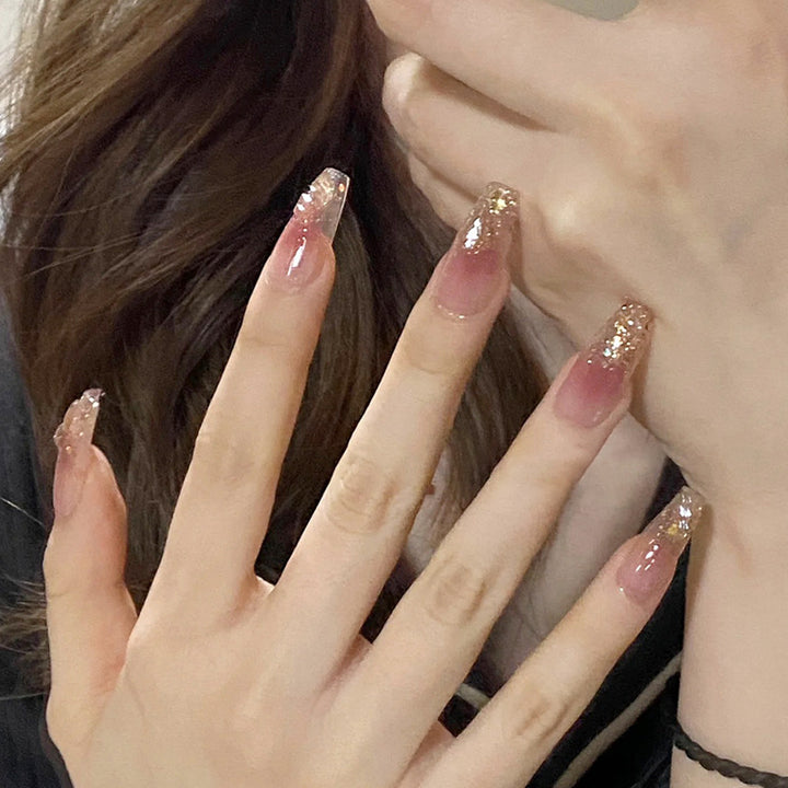 Artificial nails with glamorous glitter accents Bowlift