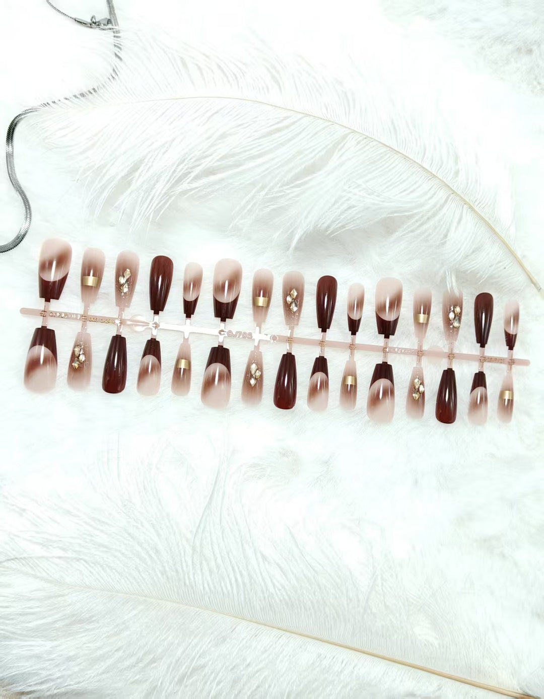 Glamorous artificial nails with elegant accents Bowlift