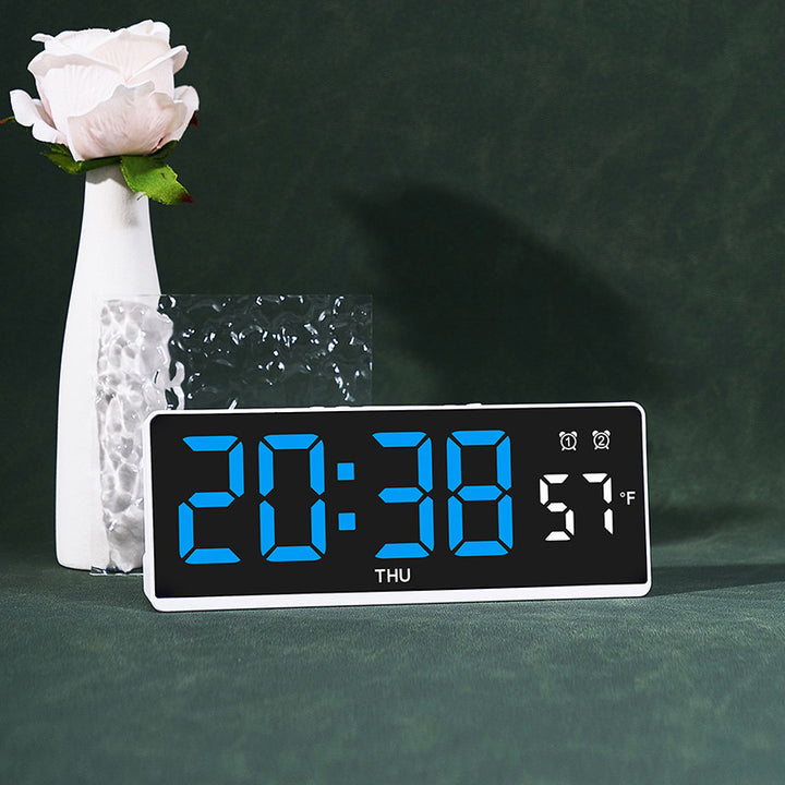 Digital alarm clock with large LED display and weather forecast Bowlift