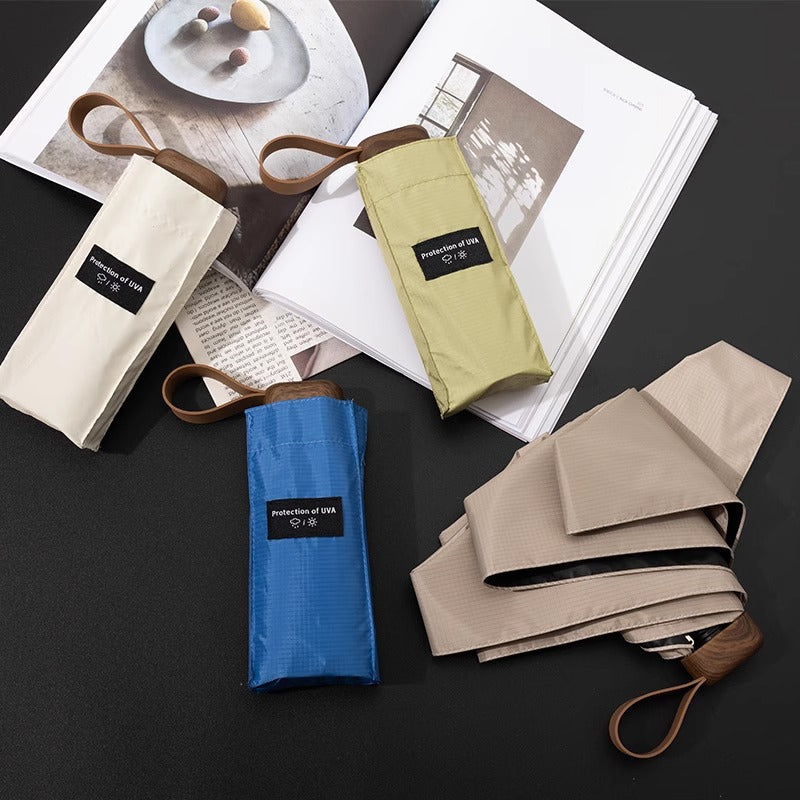 Women's ultra-light UV protection folding umbrella with convenient carrying pouch Bowlift