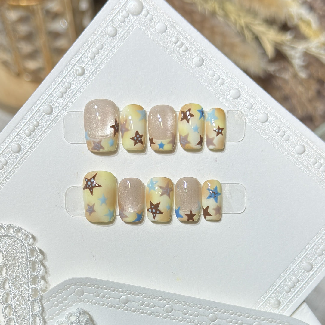 Press-On Nail Art Set with Star Accents Bowlift