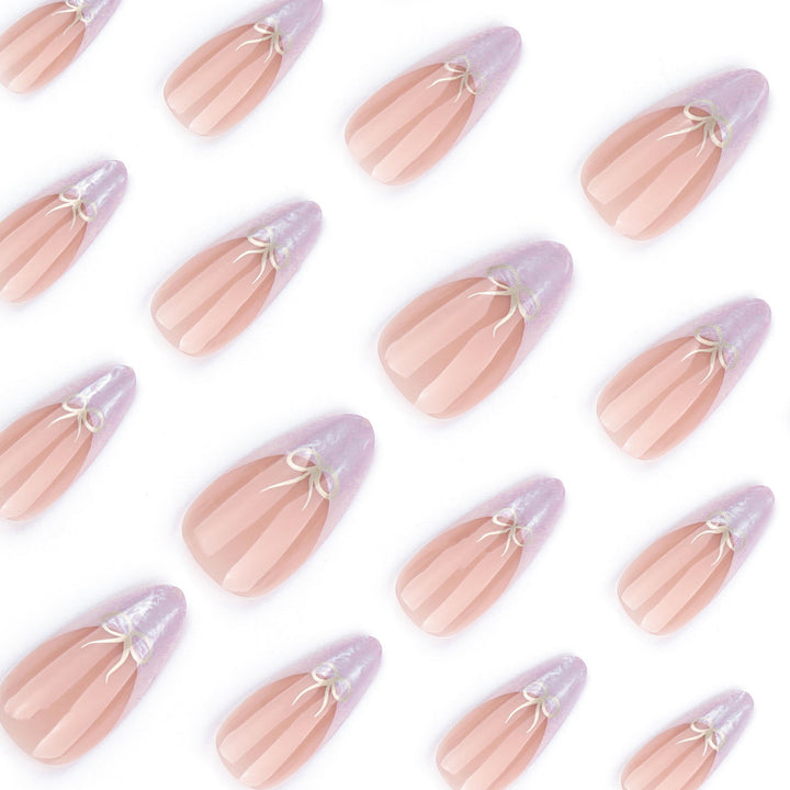 Artful stiletto nails with elegant design and radiant accents Bowlift
