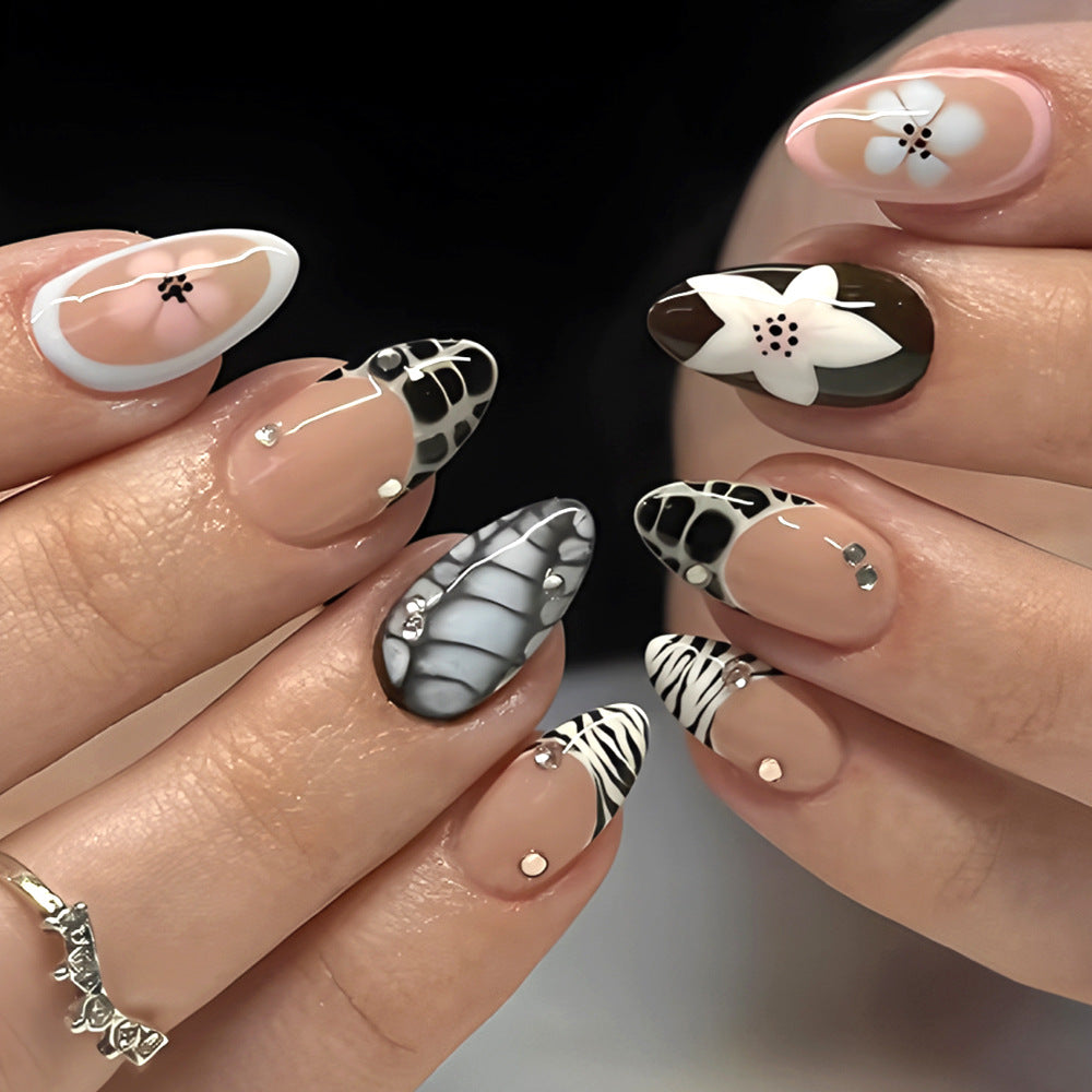 Artistic Press-On Nail Set with Floral and Textured Design Bowlift