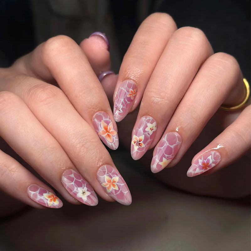 Artistic press-on nails with floral design Bowlift