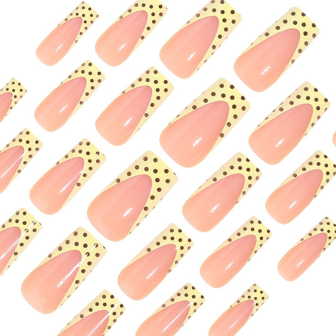 Artistic Long Nail Extensions with Polka Dot Design Bowlift