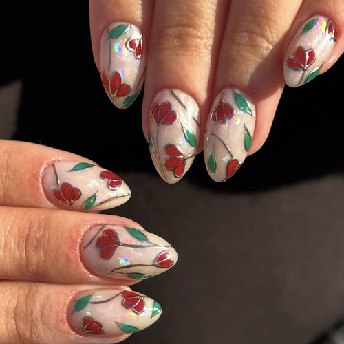 Nail art set with floral accents and glitter Bowlift