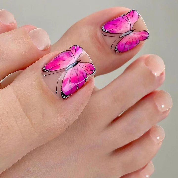 Artful toenail design with butterfly design Bowlift