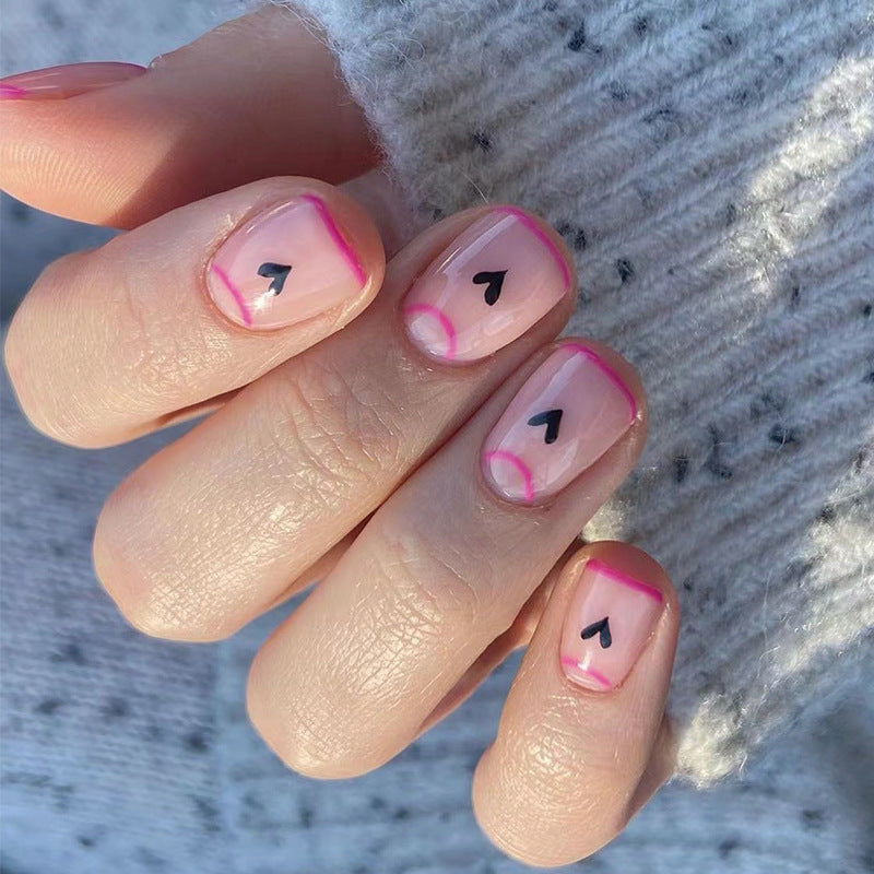 Creative Nail Art with Heart Design and Glitter Accents Bowlift