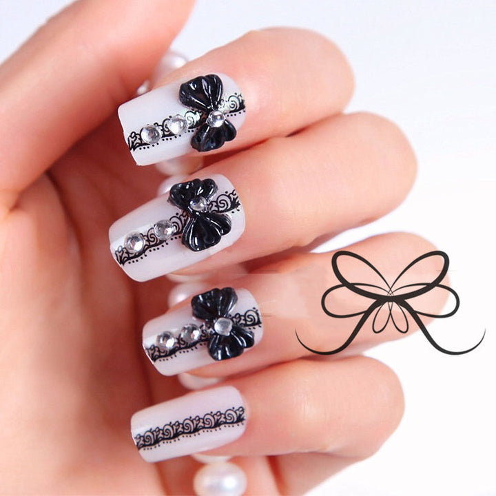 Artificial nails with elegant flower and rhinestone design Bowlift