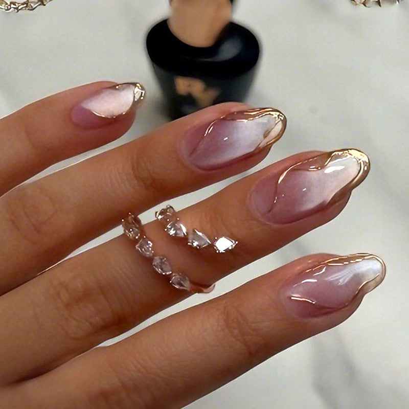 Elegant Press-On Nail Art Set with Chic Gold Accents Bowlift
