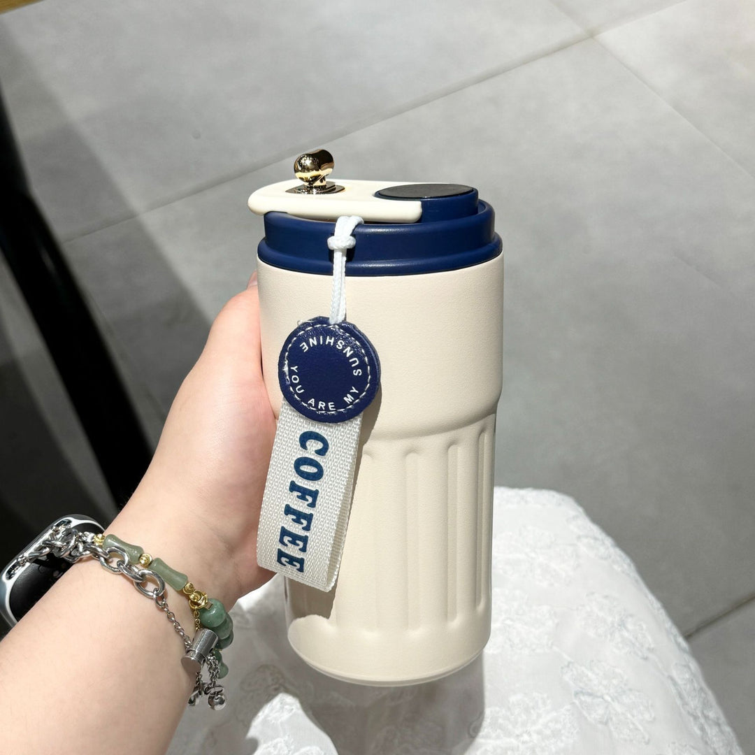 Ladies insulated cup with practical carrying strap Bowlift