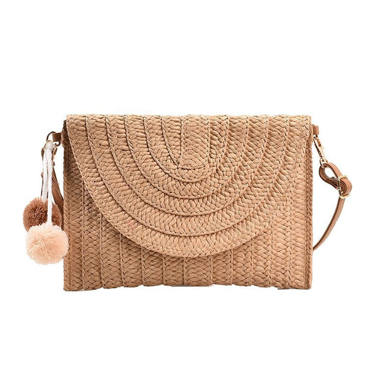Braided shoulder bag with creative pom poms Bowlift