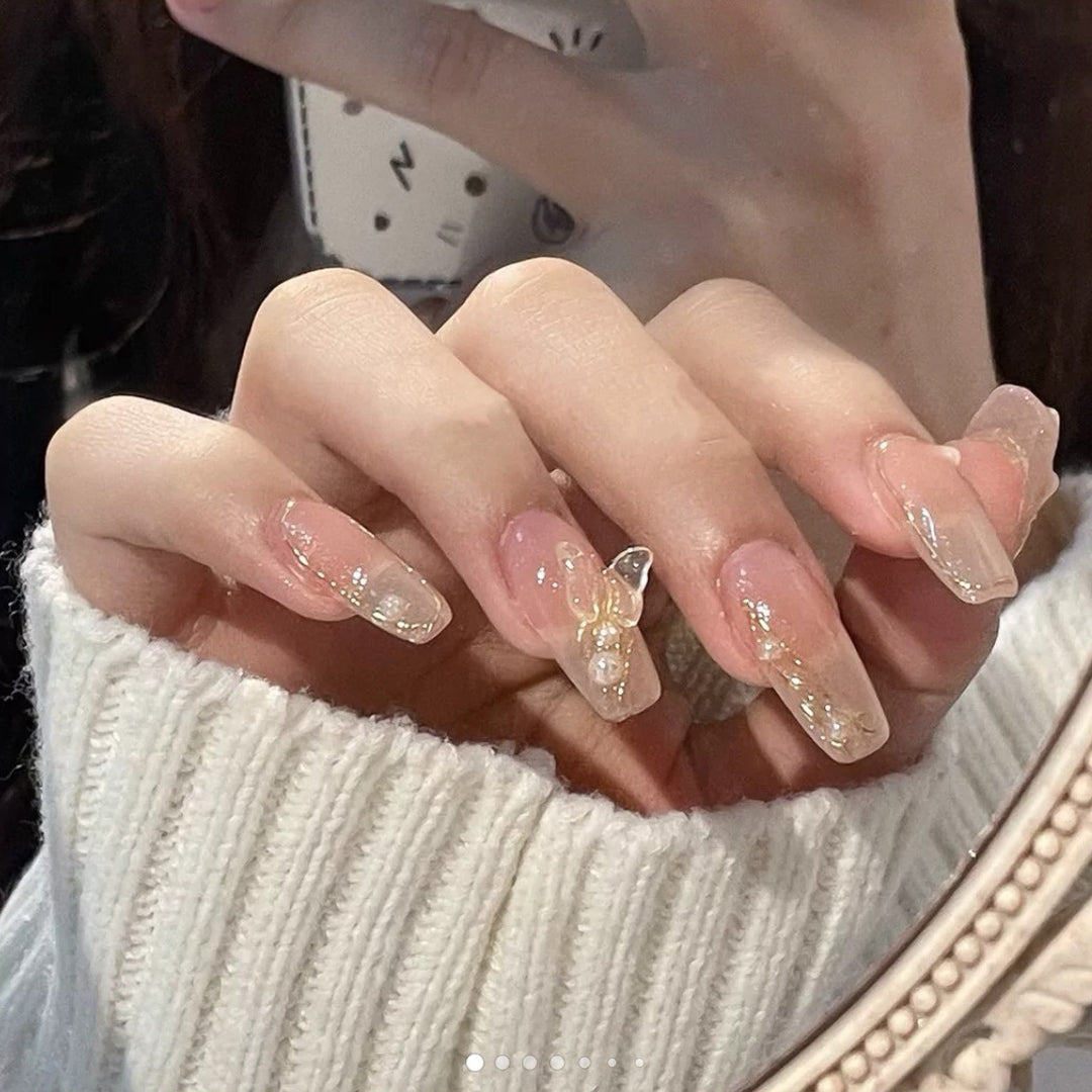 Artificial nails with elegant bows and pearl decorations Bowlift