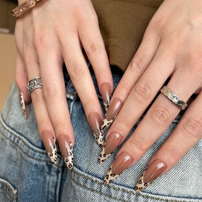 Artistic Stiletto Nails with Animal Pattern Bowlift