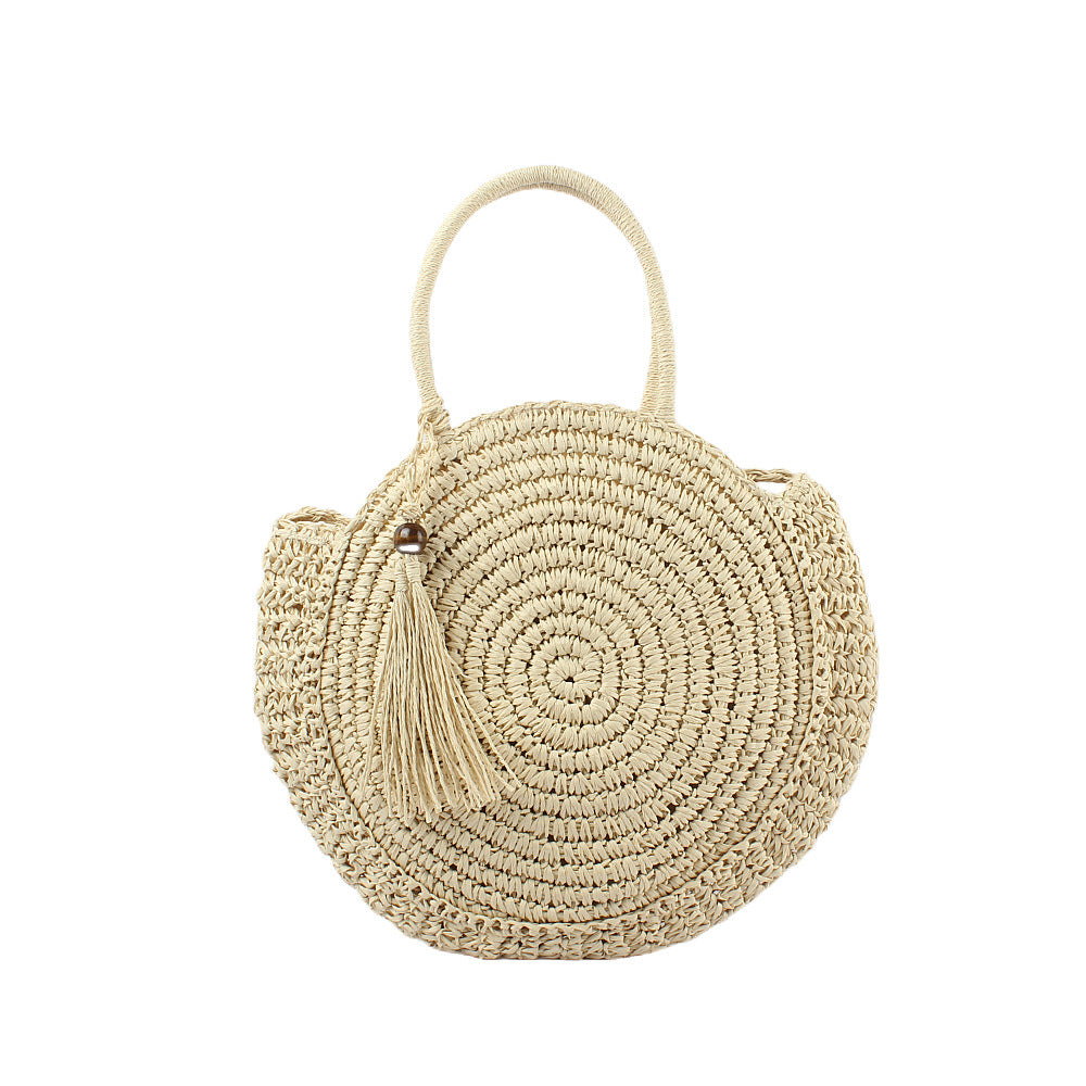Round basket bag with elegant tassel Bowlift