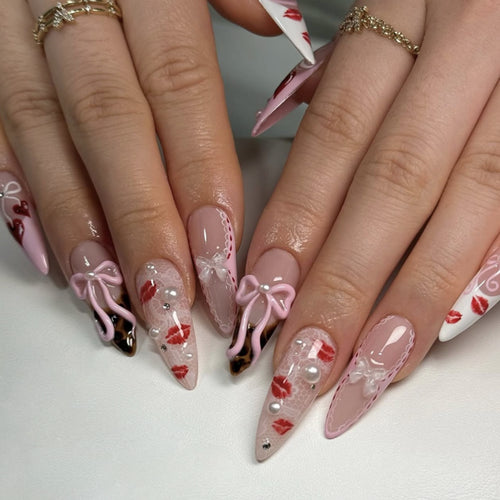 Artful Nail Art with Romantic Heart and Bow Motif Bowlift
