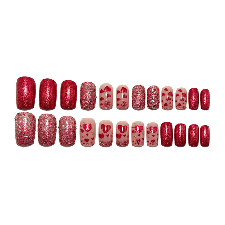 Artificial nails with heart design and glitter Bowlift