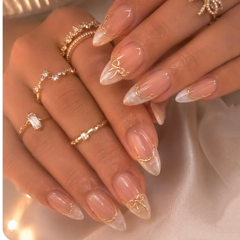 Elegant Stiletto Press-On Nails with Metallic Accents Bowlift