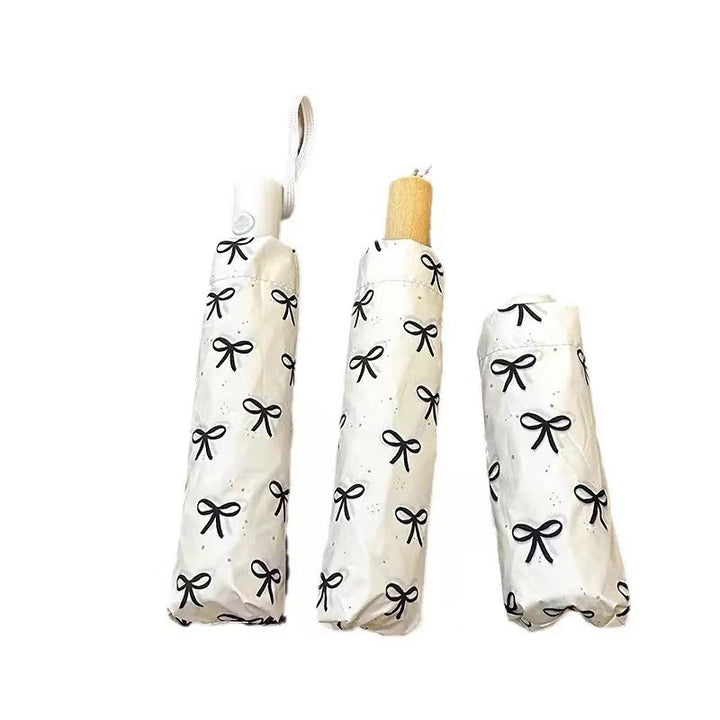 Women's foldable umbrella with elegant bow design Bowlift