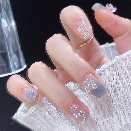 Acrylic nail set with sparkling glitter elements and appealing ombre design Bowlift