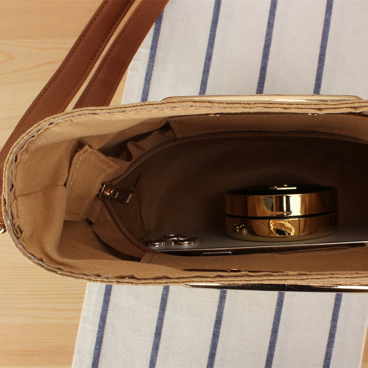 Shoulder bag made of handwoven natural material with elegant handle Bowlift