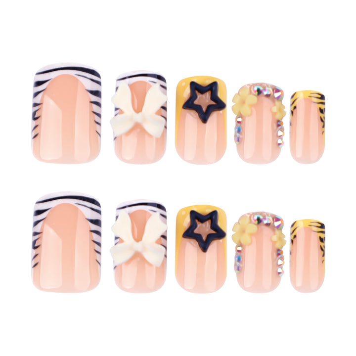 Artistic Nail Art with Glitter and Floral Accents Bowlift