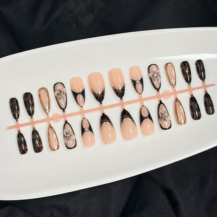 Artistic Press-On Nail Set with Elegant Floral and Abstract Designs Bowlift