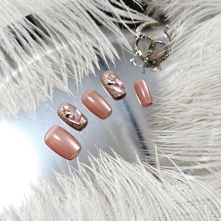 Artificial nails with glitter and crystal accents Bowlift
