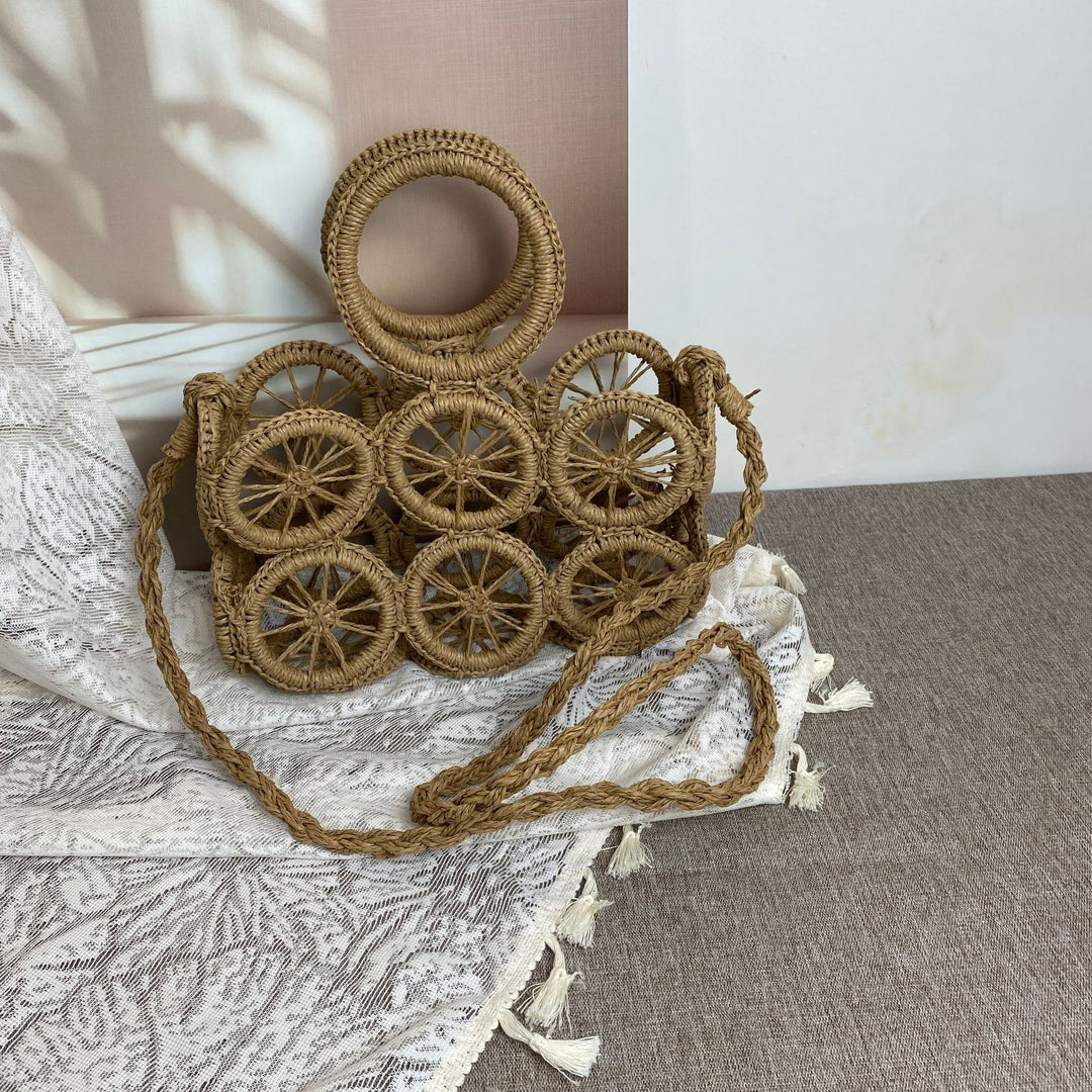 Artisan woven basket bag with striking wheel pattern Bowlift