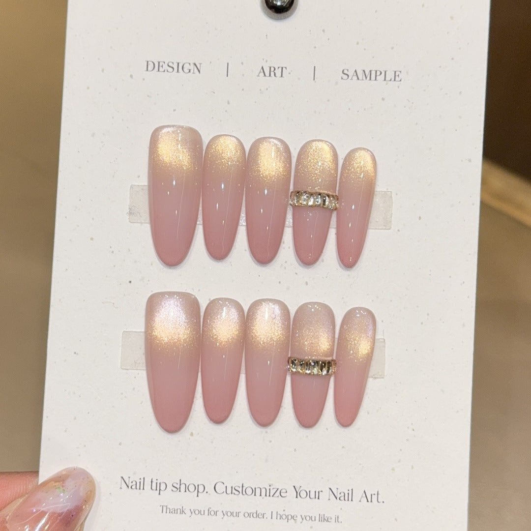 Glamorous artificial nails with elegant glitter and rhinestone application Bowlift