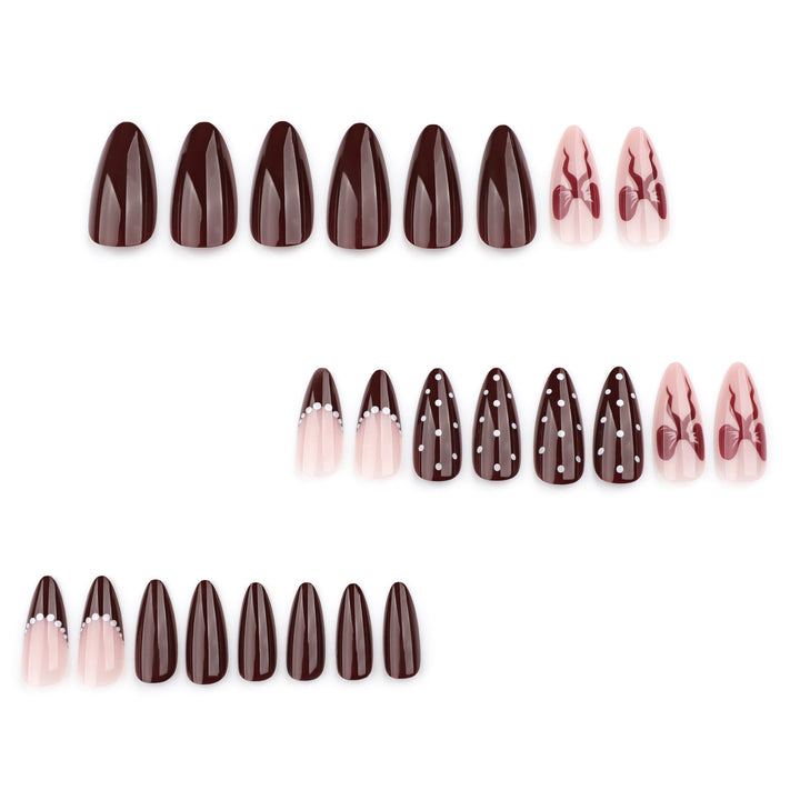 Elegantly designed stiletto nails with artistic accents Bowlift