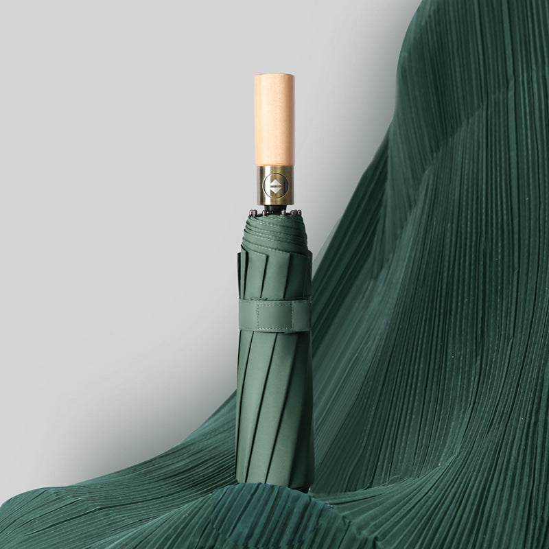 Ladies elegant foldable umbrella with ergonomic wooden handle and wind-resistant construction Bowlift