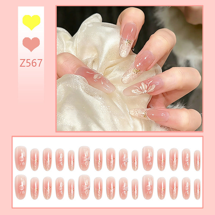 Acrylic nail set with filigree flower and glitter elements Bowlift