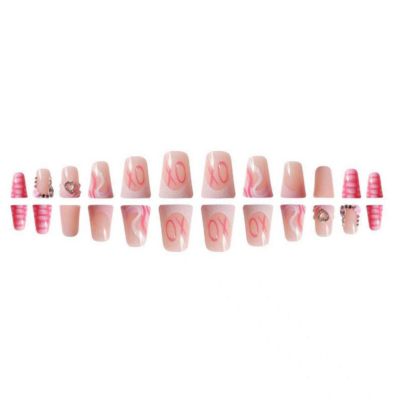 Decorative Press-On Nail Design with Heart and Gem Accents Bowlift
