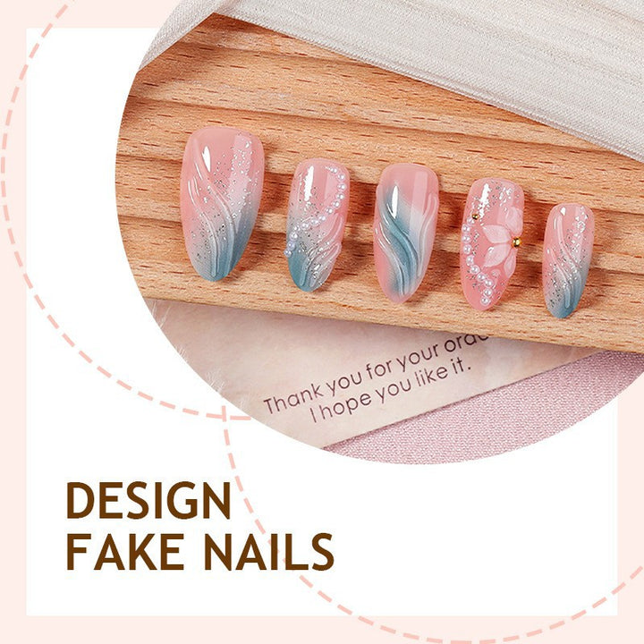 Artificial nail set with floral design and delicate accents Bowlift
