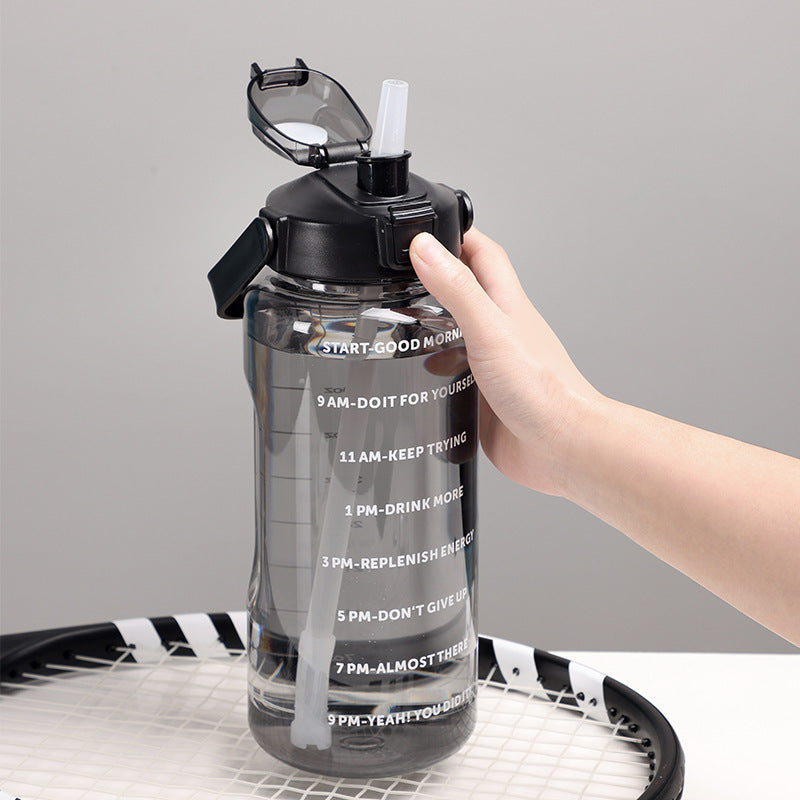 Women's motivation water bottle with integrated time markings and ergonomic design Bowlift