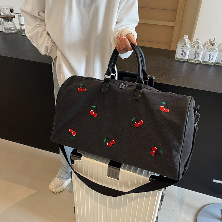 Sporty weekend bag with playful cherry pattern Bowlift