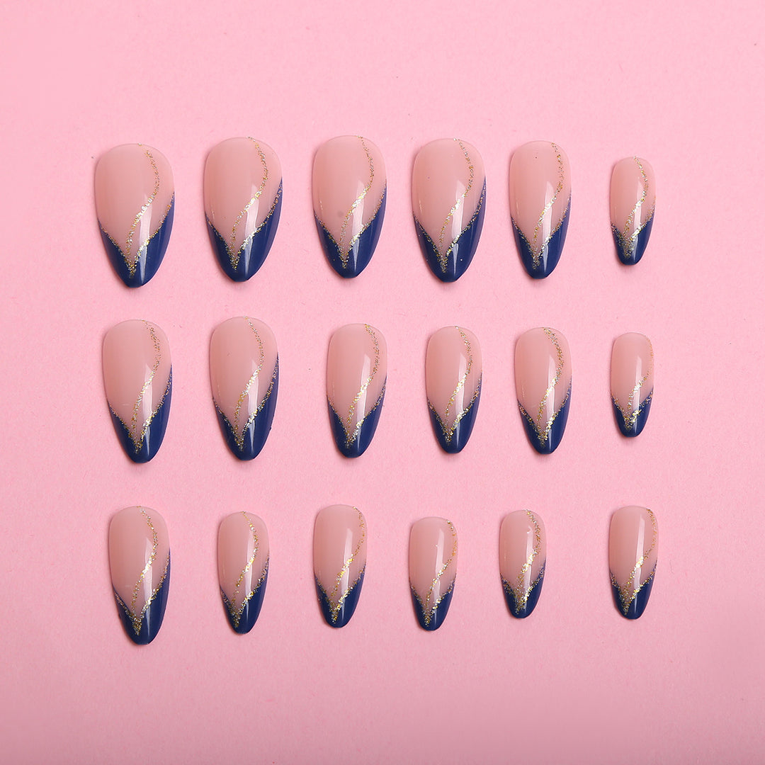 Artistic Nail Design with Elegant Golden Accents Bowlift