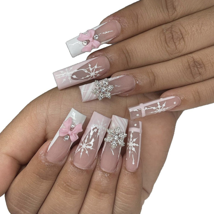 Creative nail art set with filigree snowflake and bow decorations Bowlift