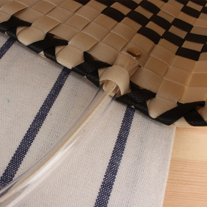 Braided shopping bag with elegant accents Bowlift