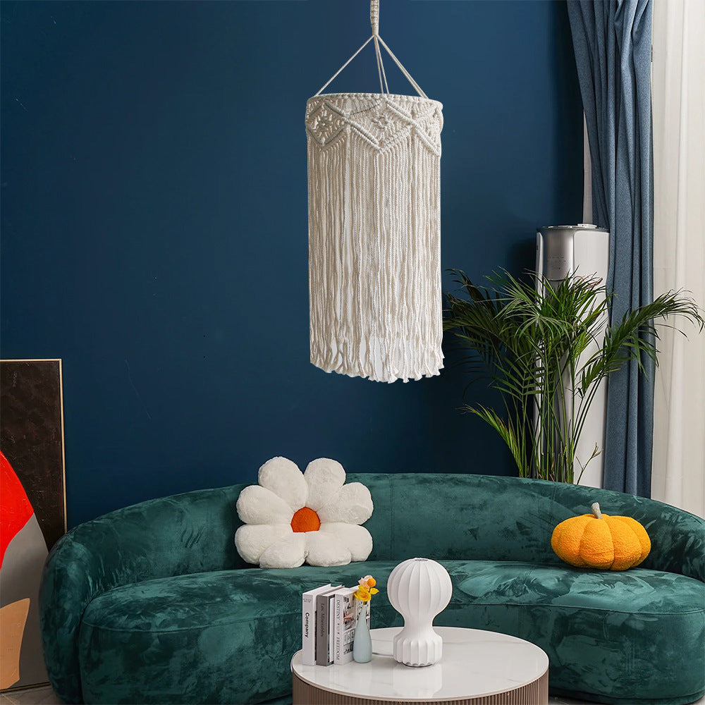 Macrame plant hanger with decorative fringes