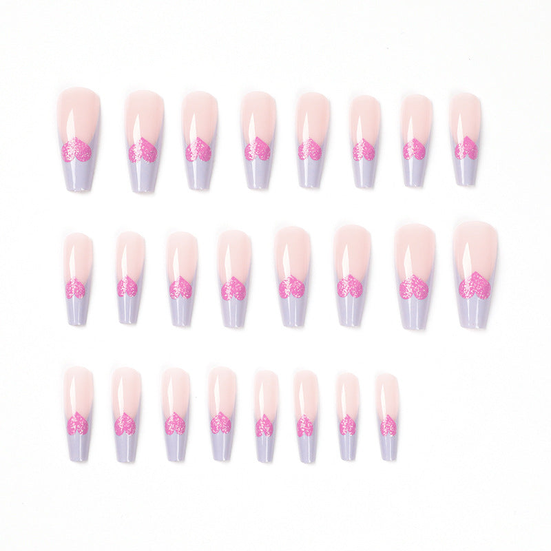Artful stiletto nails with colorful heart designs Bowlift