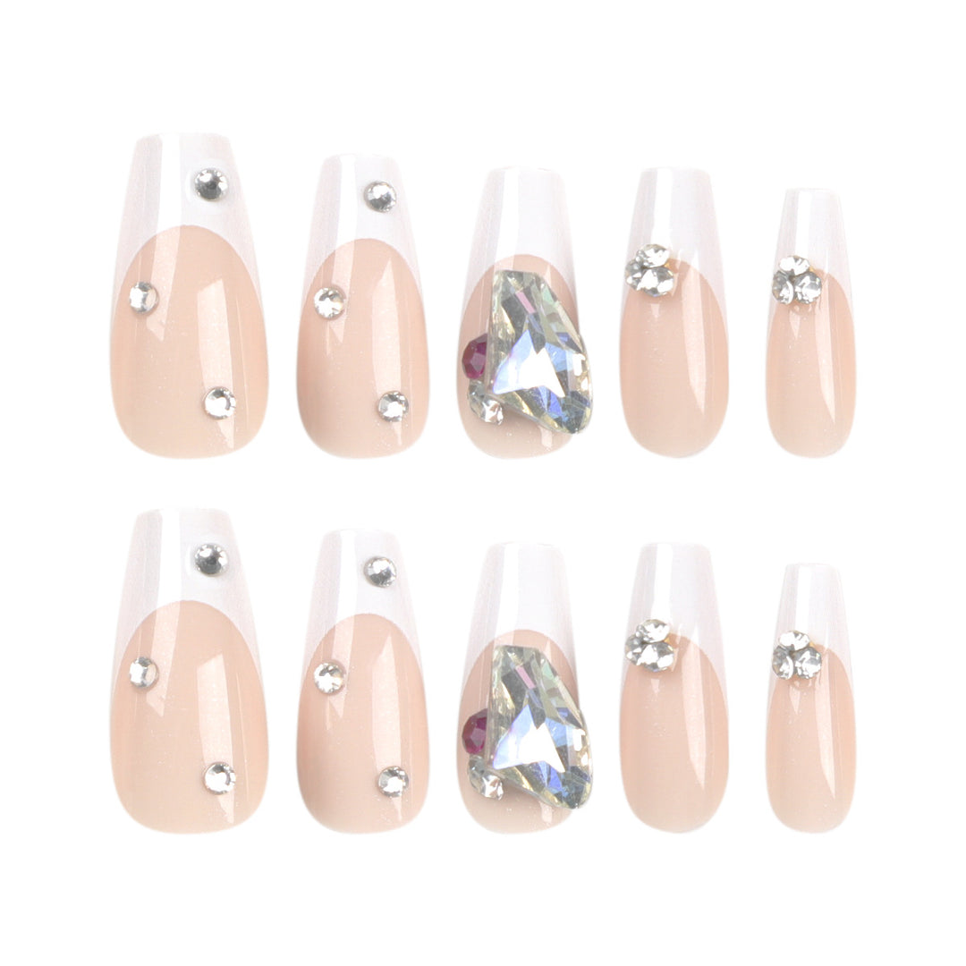 Artistic nail art with glitter accents and rhinestone embellishments Bowlift