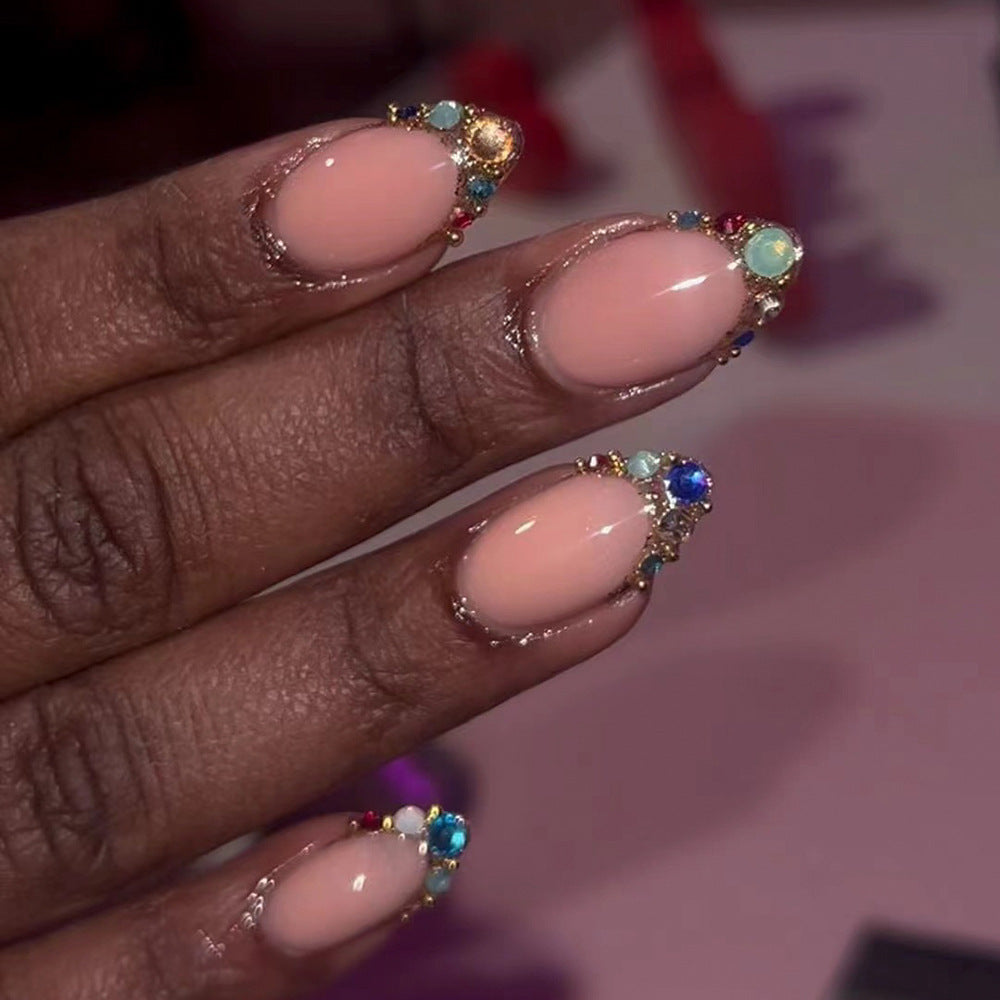 Artful nail art with glamorous rhinestone embellishments Bowlift